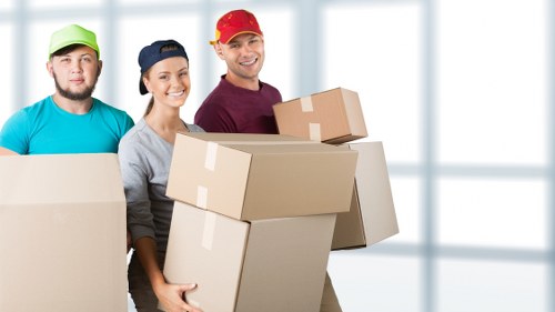Local packing team working carefully in a Bedfordpark property